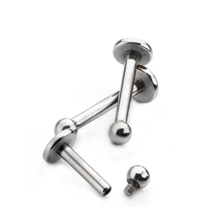 Polished G23 titanium labret studs set with flat back and internal thread ball design