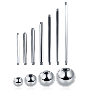G23 titanium barbell piercing set with various shaft lengths and ball sizes on white background