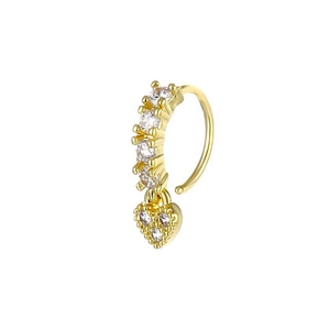 Close-up of golden non-pierced nose ring with heart pendant and sparkling cubic zirconia