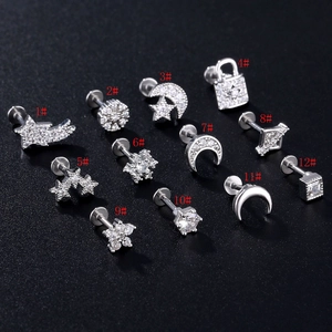 Set of 12 stainless steel cartilage studs with zircons in star, moon, and heart shapes