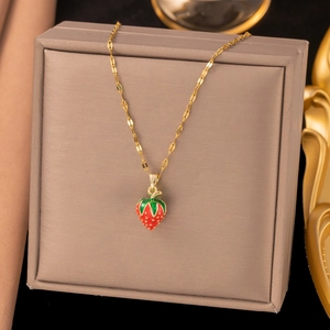 Chic strawberry pendant necklace with red enamel finish and delicate golden chain