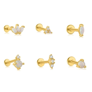 Golden labret stud set with white opal stones in crown and flower shapes