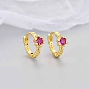 Gold-plated S925 silver hoop earrings featuring red zircon stones and beaded texture