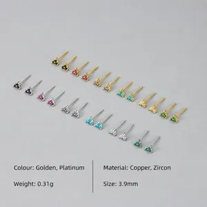Gedetailleerd macro-zicht van 3,9 mm klaver oorknopjes met kleurrijke edelstenen