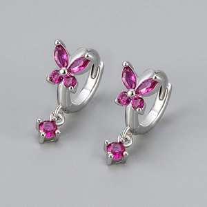 Silver butterfly hoop earrings with vibrant pink zircon stones in a symmetrical design
