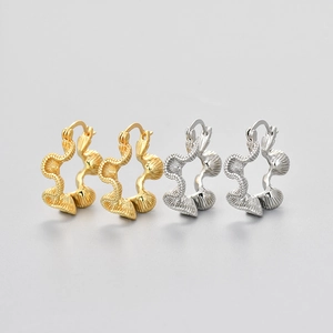 Artistic C-shape earrings with textured ruffle design in gold and silver set