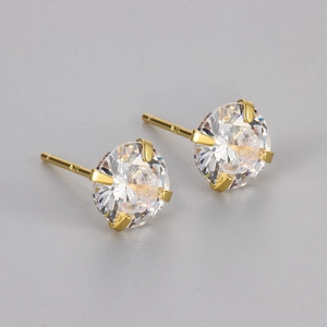 Boucles d'oreilles minimalistes en argent S925 doré avec un brillant zircon rond
