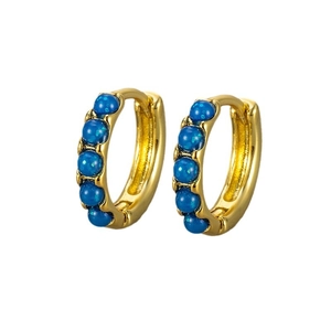 Elegant gold hoop earrings with five round blue opal stones for a minimalist luxury look