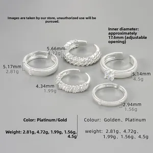 Five-piece vintage silver ring set with textured engraving and adjustable open band design