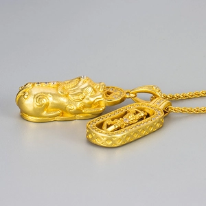 Exquisite gold Pixiu and Vajra pendant necklace with intricate hollow filigree details