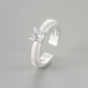 Vintage style textured gold-plated adjustable ring with a brilliant round zircon stone
