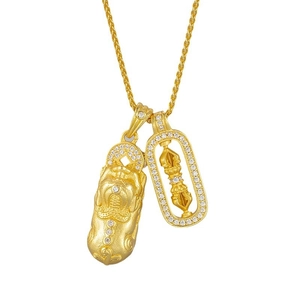 Golden Pixiu and Vajra Pestle necklace with diamond accents and hollow filigree design