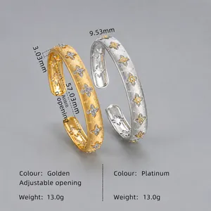 Detailed view of S925 silver bangles showing 9.53mm width and brushed metal texture