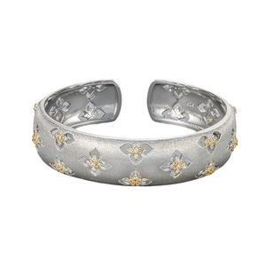 Minimalist S925 silver open bangle with brushed texture and golden clover zircon motifs