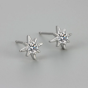 French vintage eight-pointed star stud earrings with sparkling center crystal