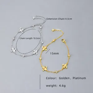 Detailed view of silver and gold fleur-de-lis bracelets with dimensions and metal texture