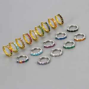 Macro view of colorful zircon huggie earrings with detailed dimensions and measurements