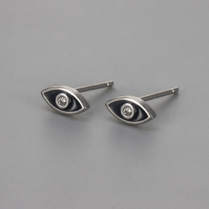 Minimalist evil eye stud earrings with black enamel and sparkling center cubic zirconia