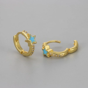 Detail of gold star earrings with blue enamel and zircon stones in open and closed views