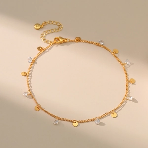 Tobillera bañada en oro de 18K con colgantes de discos circulares y circonitas brillantes