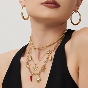 Layered gold necklaces with multiple charms and chunky hoop earrings set for women