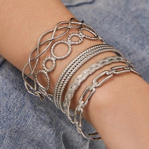 6-piece silver vintage stainless steel cuff bracelet set on denim backdrop