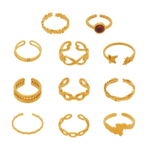 11-piece vintage gold-plated ring set featuring star, heart, and aventurine designs