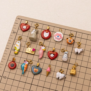 DIY colorful enamel charms in assorted shapes like hearts and cats for jewelry making