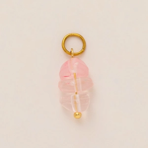 Detail of pink crystal beads pendant with 18K gold plated skull charm DIY accessory