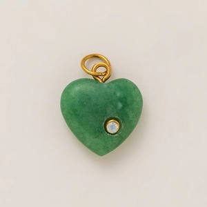 Detail of green aventurine heart pendant with a single crystal and gold-tone jump rings