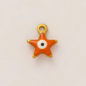 Detail of star-shaped pendant with orange enamel and blue evil eye in gold plating