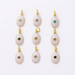 Gold plated oval enamel pendants with colorful birthstone zircons in a 3x3 grid display