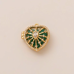 Macro view of heart locket pendant with green malachite stone and small white diamonds