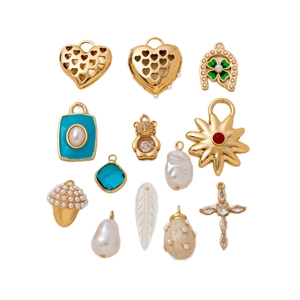 Golden heart, horseshoe, and pearl pendant collection for DIY jewelry making