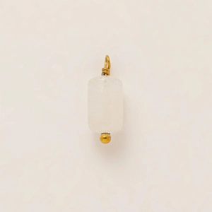 Detail of white cylindrical stone pendant with 18K gold-plated wire wrap and bead