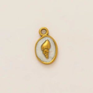 Detailed macro of oval 18K gold-plated pendant with conch seashell embossed in white