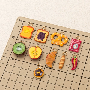 10-piece realistic resin food charm set including croissant and toast with gold rings