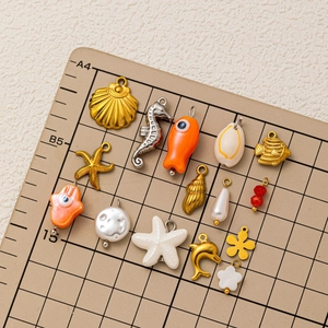 Various 18K gold plated stainless steel marine pendants like seahorse and starfish for DIY