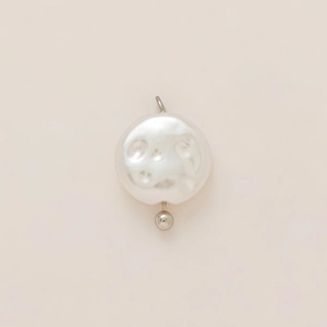Detail of a natural baroque coin pearl pendant with 18K gold plated loop for DIY jewelry