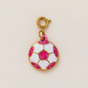 Detailed view of pink and white glitter soccer charm with gold spring clasp for jewelry