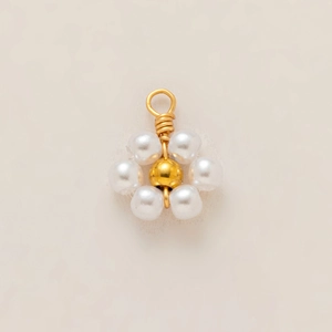 Detailed close-up of 18K gold-plated stainless steel flower pendant with white pearls