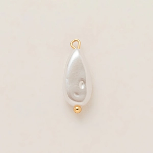 Detail of baroque drop pearl pendant with 18K gold plated metal ring and bead accents