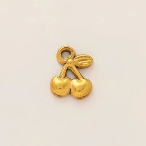 Detailed view of polished 18K gold-plated stainless steel double cherry pendant accessory
