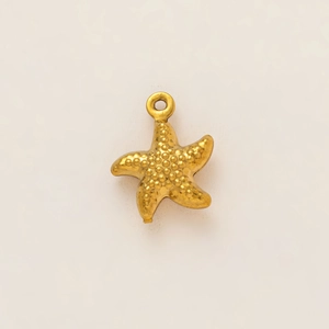 Macro shot of 18K gold-plated starfish pendant with realistic textured metal detail