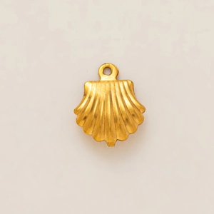 Macro detail of 18K gold plated seashell pendant showing textured stainless steel ribs