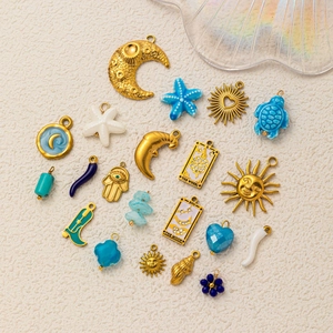 Blue ocean-themed 18k gold-plated stainless steel charms with moon and star shapes