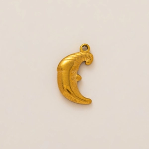 Detailed view of vintage 18K gold plated crescent moon pendant with face features