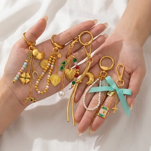 Porte-clés de Mode DIY en Cuivre Plaqué Or 18K Bijou de Sac Avec Perle Artificielle Strass Nœud pour Femmes Filles Cadeau