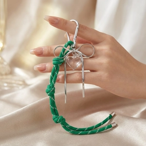 Forest green woven rope keychain with silver lobster clasp and clear heart pendant