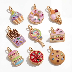 Nine-piece set of 14K gold plated enamel dessert charms with colorful rhinestones